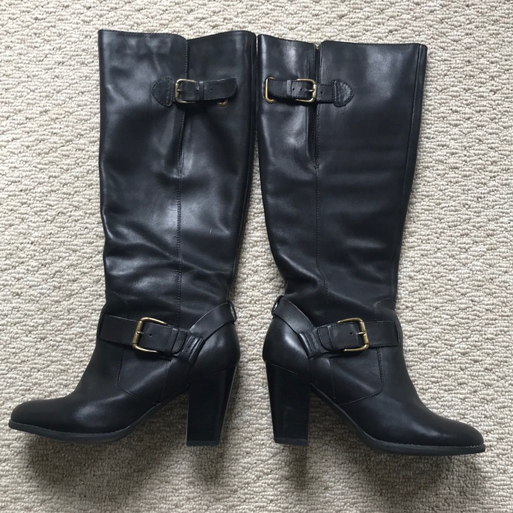 Clark’s black leather knee high boots.